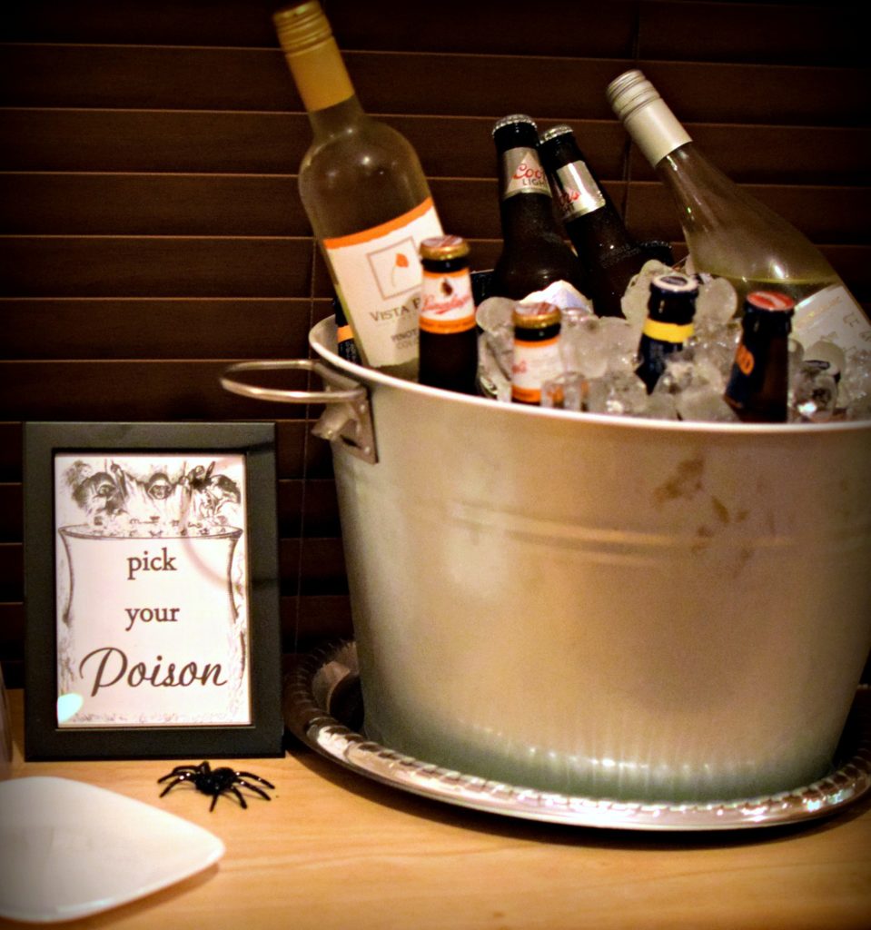 Need help hosting a halloween party? Check out this post for easy Halloween Decorations. For some extra fun throw a costume contest. These free Halloween party printables include a Pick you Poison sign, Costume Contest, and fillable halloween party food cards. 