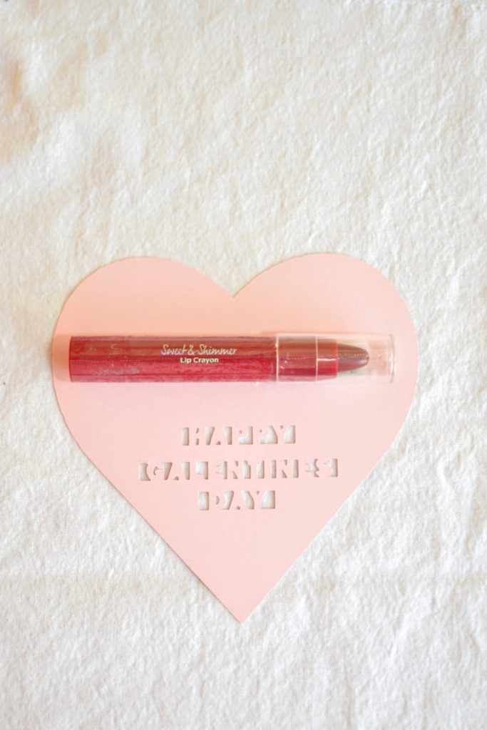 Pink heart Galentines card with lip shimmer gift